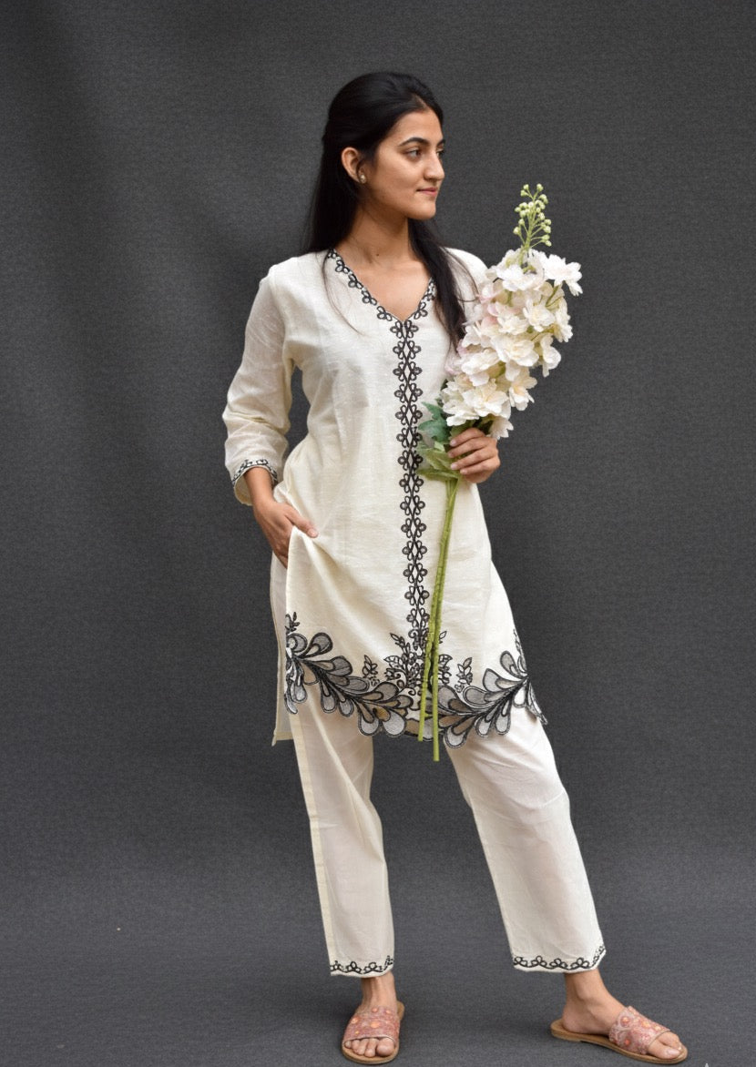 OFF WHITE COTTON KURTA SET WITH BLACK THREAD WORK AND CUT WORK BESU INDIA