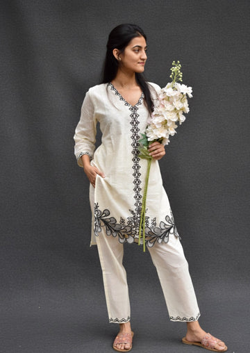 OFF WHITE COTTON KURTA SET WITH BLACK THREAD WORK AND CUT WORK BESU INDIA