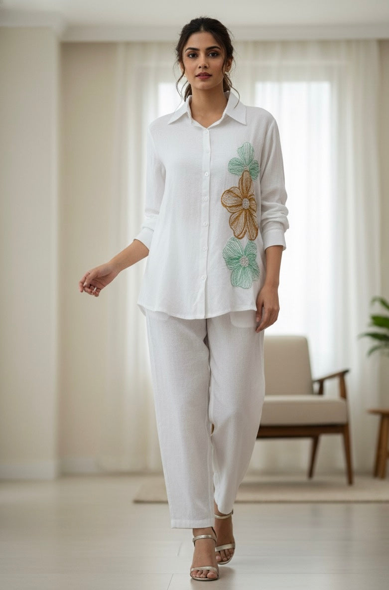 WHITE LINEN COLOURFUL THREAD EMBROIDERED AND EMBELLISHED CO-ORDS BESU INDIA