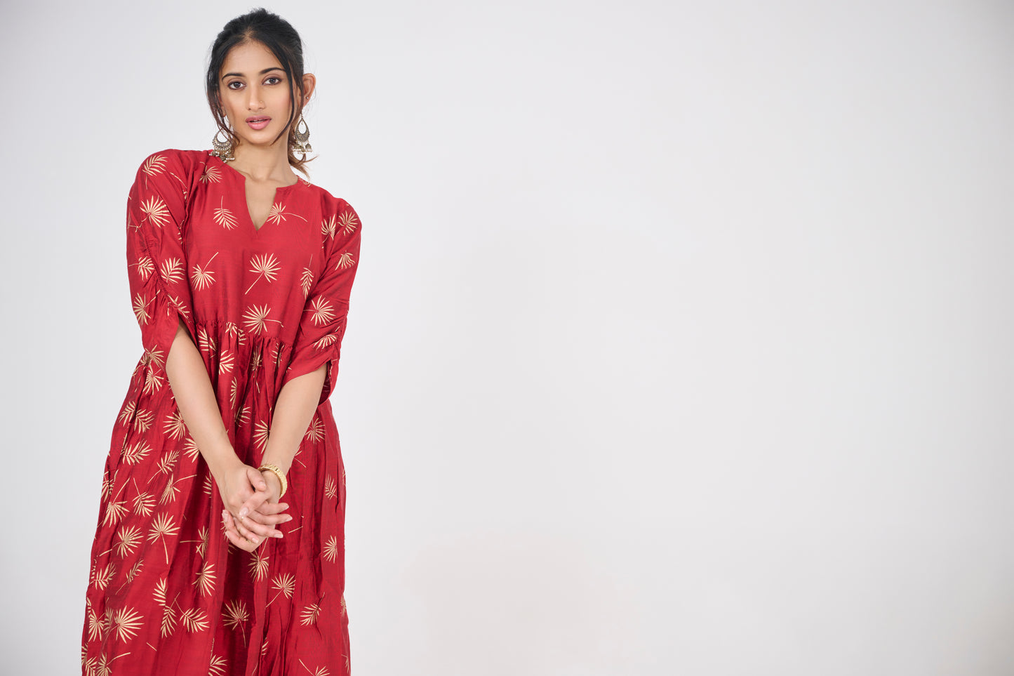 GOLD LEAF PRINTED ON RED FLARED TOP BESU INDIA