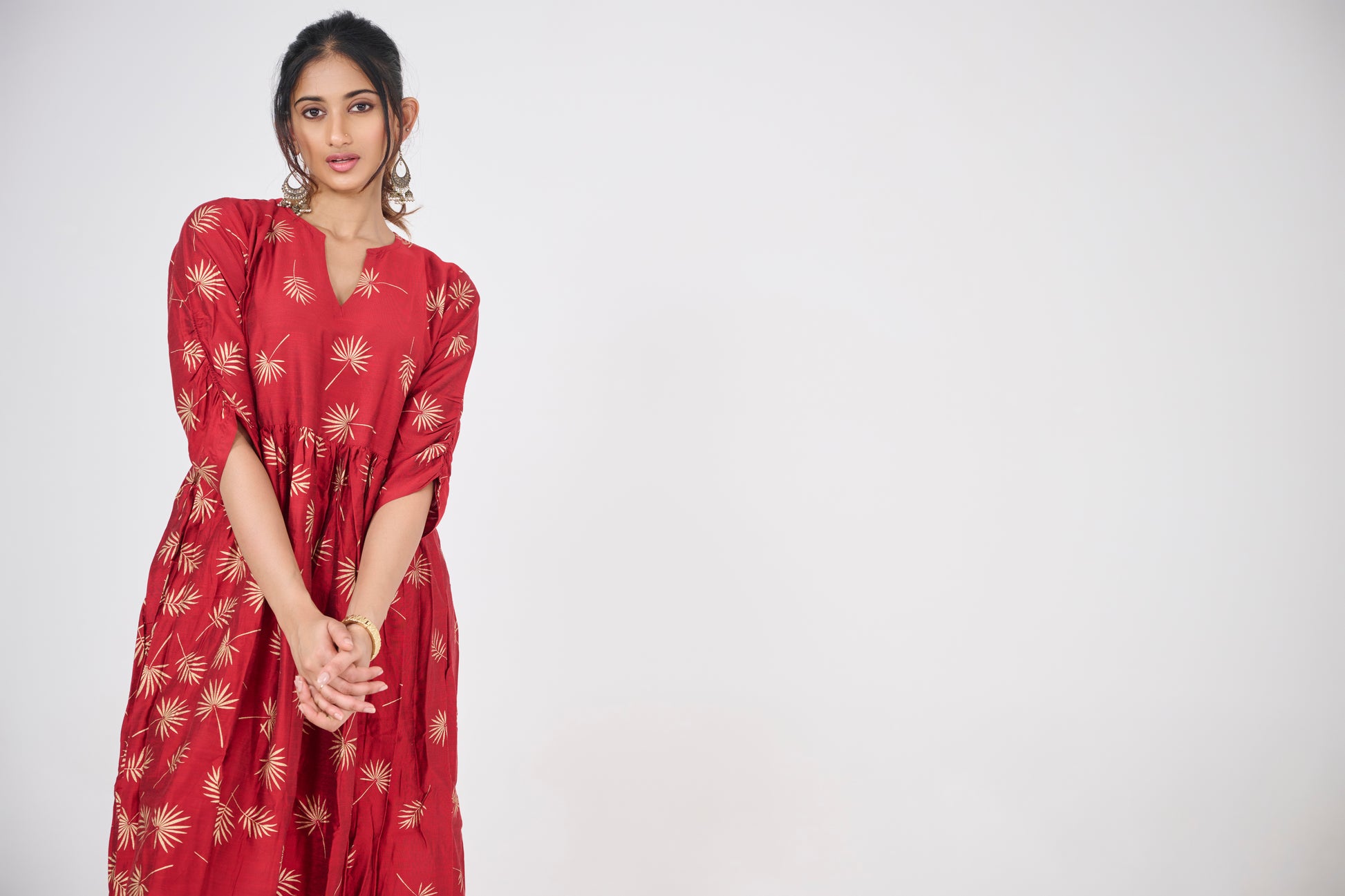 GOLD LEAF PRINTED ON RED FLARED TOP BESU INDIA