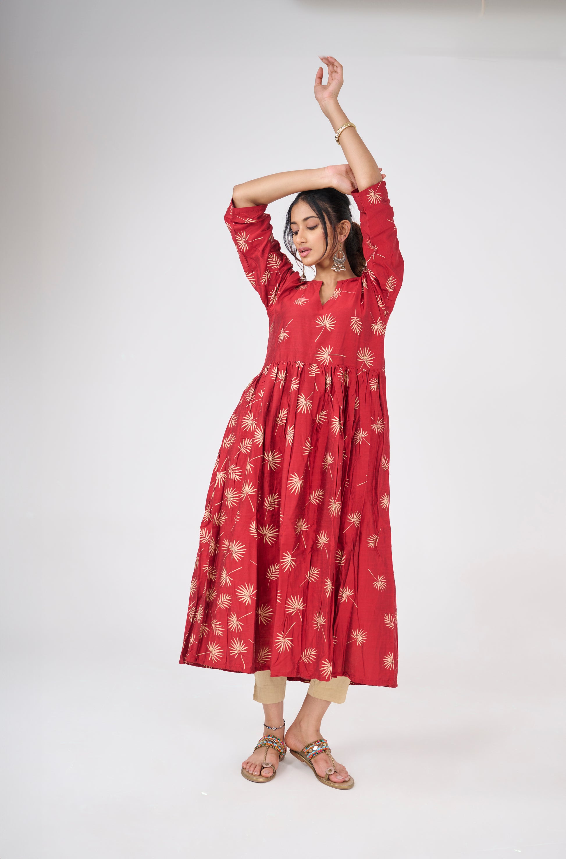GOLD LEAF PRINTED ON RED FLARED TOP BESU INDIA