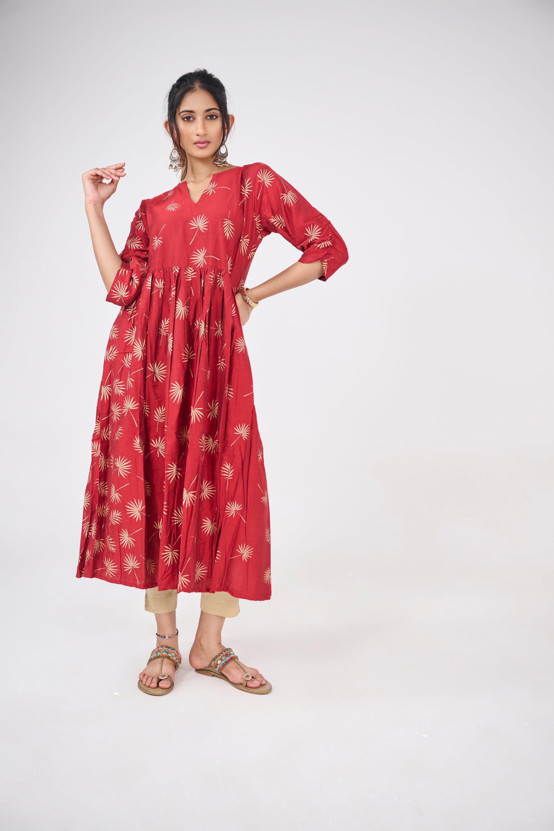 GOLD LEAF PRINTED ON RED FLARED TOP BESU INDIA